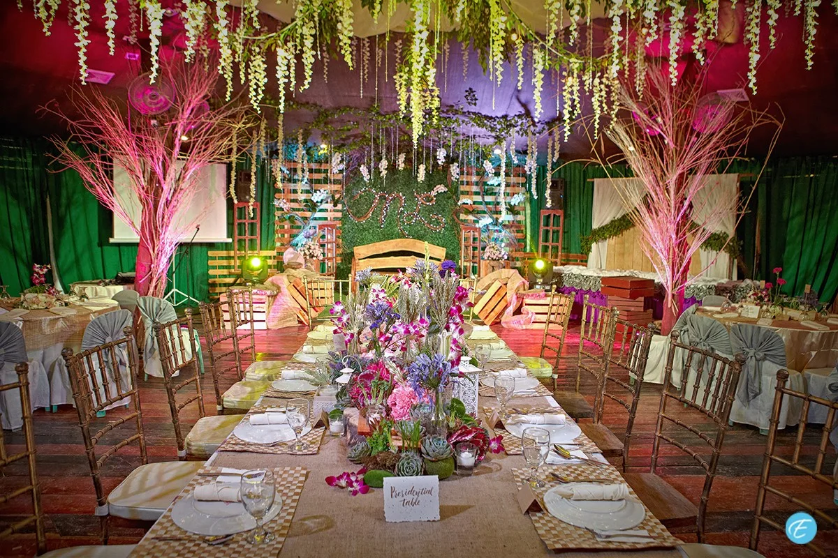 A wedding reception table with floral decor
